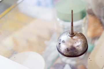 Oil dispenser machine made a metal