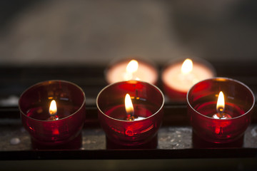 red candles in a church