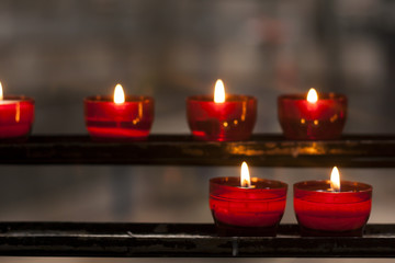 red candles in a church