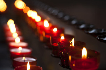 red candles in a church