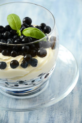 Yogurt with blueberry on glass