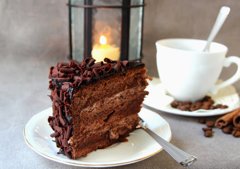 A piece of chocolate cake and coffee..