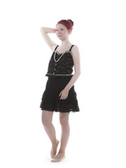 Young lady with red hair in studio