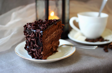 A piece of chocolate cake and coffee..