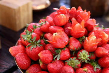 dish with fresh strawberries closeup