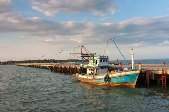 Fishing boats moored alongside the pier