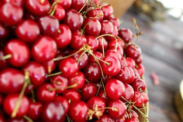 dish with fresh cherries closeup