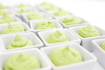 butter mixed with herbs in small plates at the buffet