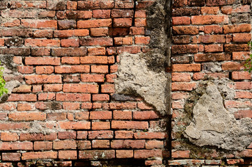Damaged old brick wall