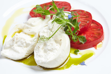 appetizer with tomato and buffalo cheese