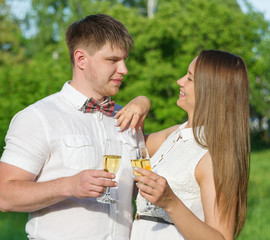 Young couple at a picnic in a city park