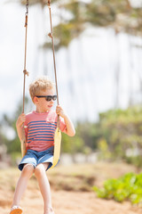 boy at swings