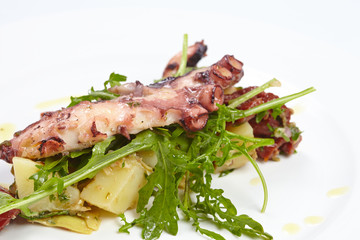 octopus with potatoes, arugula