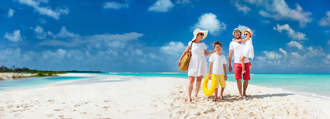 Family on a tropical beach vacation