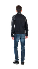 Back view of handsome man in winter jacket  looking up.
