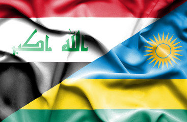 Waving flag of Rwanda and Iraq
