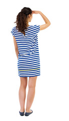 back view of standing African-American  woman