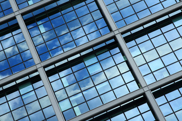 Modern architectural background; blue windows with a nice reflection effect