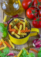 Colored pasta from wheat, spinach and tomatoes