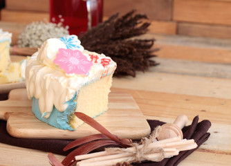 White cream cake delicious on wood background
