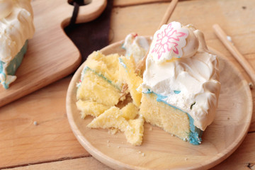 White cream cake delicious on wood background
