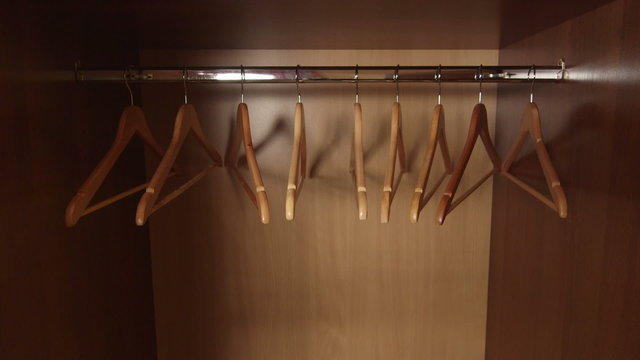 Opening door of the empty wardrobe