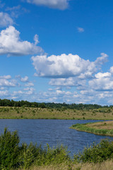 Fototapeta na wymiar Beautiful landscape with a river in the village