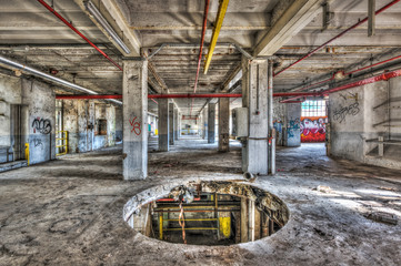 Gaping hole in an abandoned industrial building