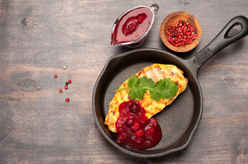 Grilled chicken breast with berry sauce