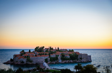 Fototapeta na wymiar Sunset at Sveti Stefan island in Montenegro, Balkans, Adriatic Sea.