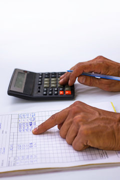 Accountant checking numbers on a document