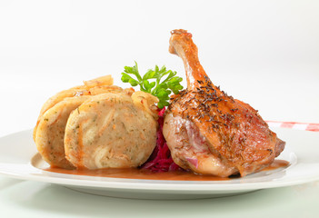 Roast duck with bread dumplings and red cabbage