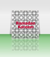 Calligraphy of Arabic text of Ramadan Kareem for the celebration of Muslim community festival.