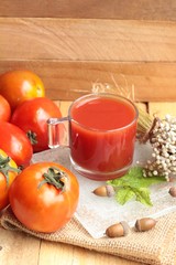 Tomato juice and fresh tomatoes