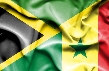 Waving flag of Senegal and Jamaica