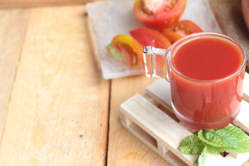 Tomato juice and fresh tomatoes
