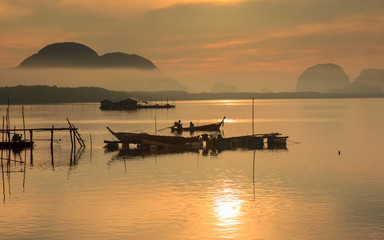 Fototapeta na wymiar Good morning fishing village and sunrise at Sam Chong-tai, Phang Nga, Thailand, edit warm tone