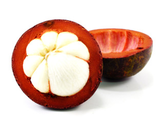 mangosteen fruit cut in half on white background