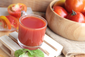 Tomato juice and fresh tomatoes