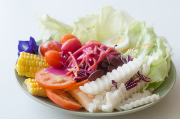 Fresh vegetable salad with beetroot sauce