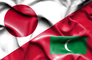 Waving flag of Maldives and Japan