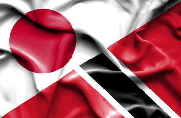 Waving flag of Trinidad and Tobago and Japan