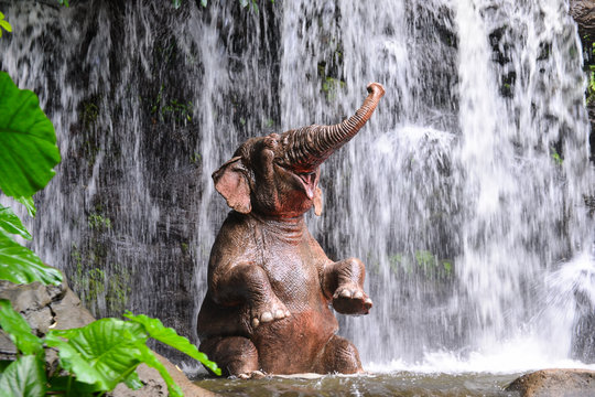 Elephant is bathing at the waterfall