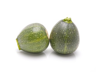 green zucchini isolated on white background