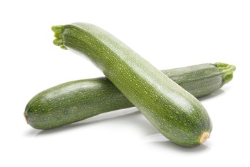 green zucchini isolated on white background