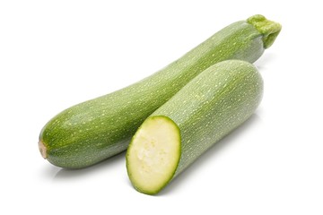 green zucchini isolated on white background