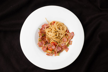 Spaghetti with dried chilli ,bacon and garlic.