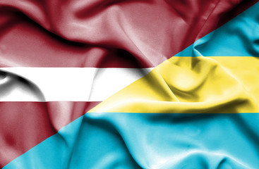 Waving flag of Bahamas and Latvia