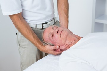 Fototapeta premium Man receiving neck massage 
