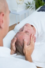 Fototapeta na wymiar Man receiving head massage 